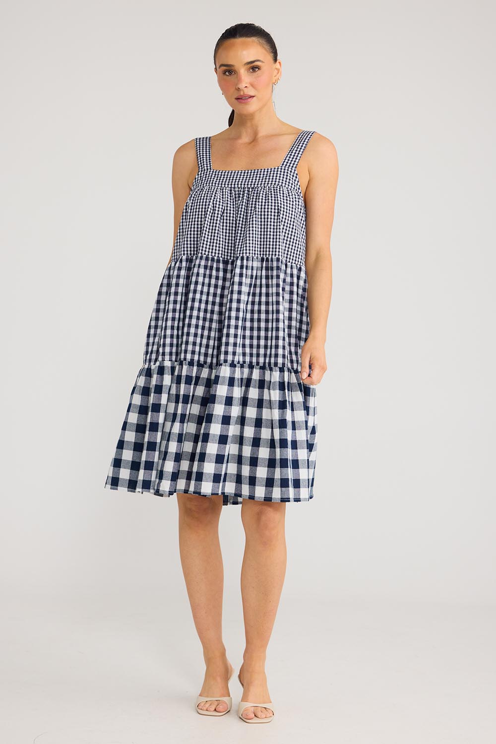 Model Genericm wearing size sample of the Clarice Dress - Navycheck in colour Navycheck, from the front