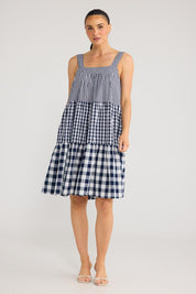 Model Genericm wearing size sample of the Clarice Dress - Navycheck in colour Navycheck, from the front