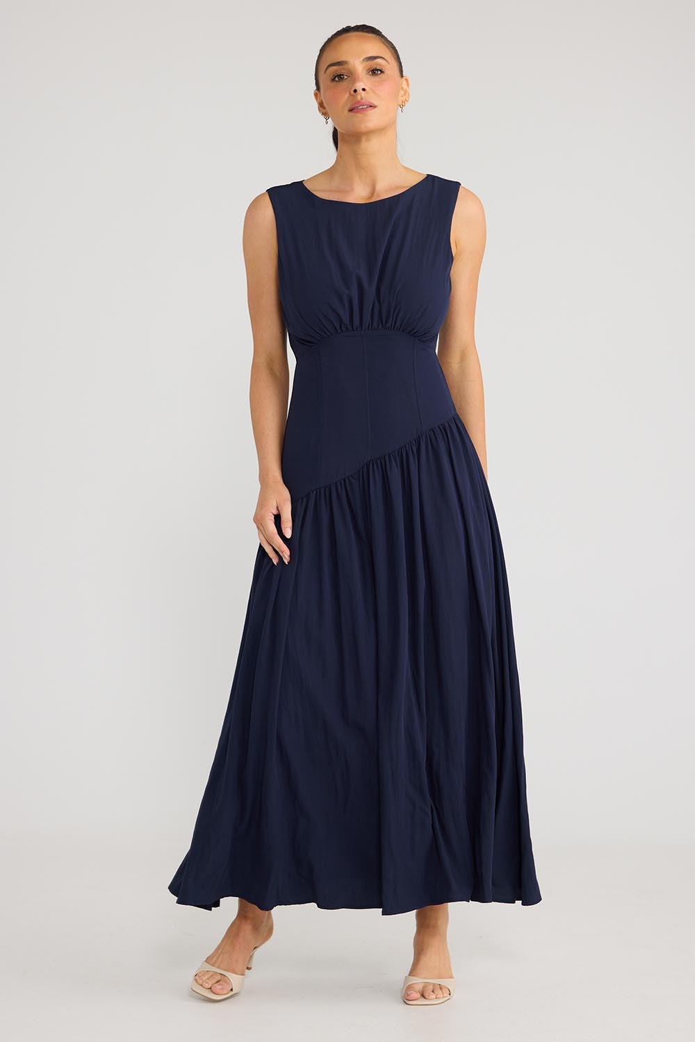 Model Genericm wearing size sample of the Tamara Dress - Inknavy in colour Inknavy, from the front