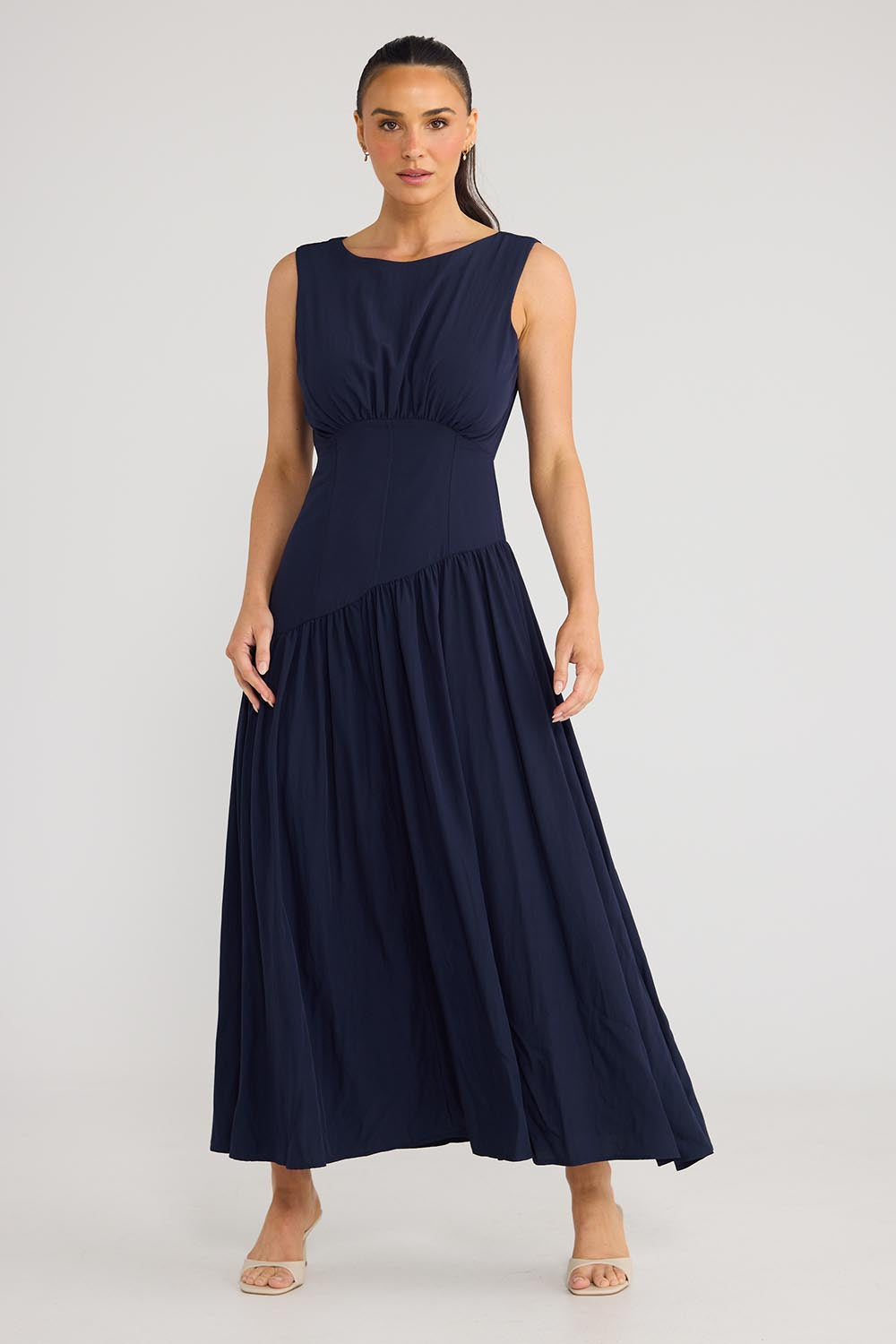 Model Genericm wearing size sample of the Tamara Dress - Inknavy in colour Inknavy, from the front