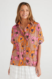 A model wearing the Alice Shirt in colour Bromley, from the front, cropped image