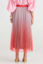 A model wearing the West End Skirt in colour Pinkred (Pink), from the back