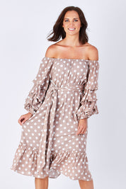 Model Perrie wearing size S-M of the Saloon Dress in colour BlushDot (Pink), from the front, cropped image