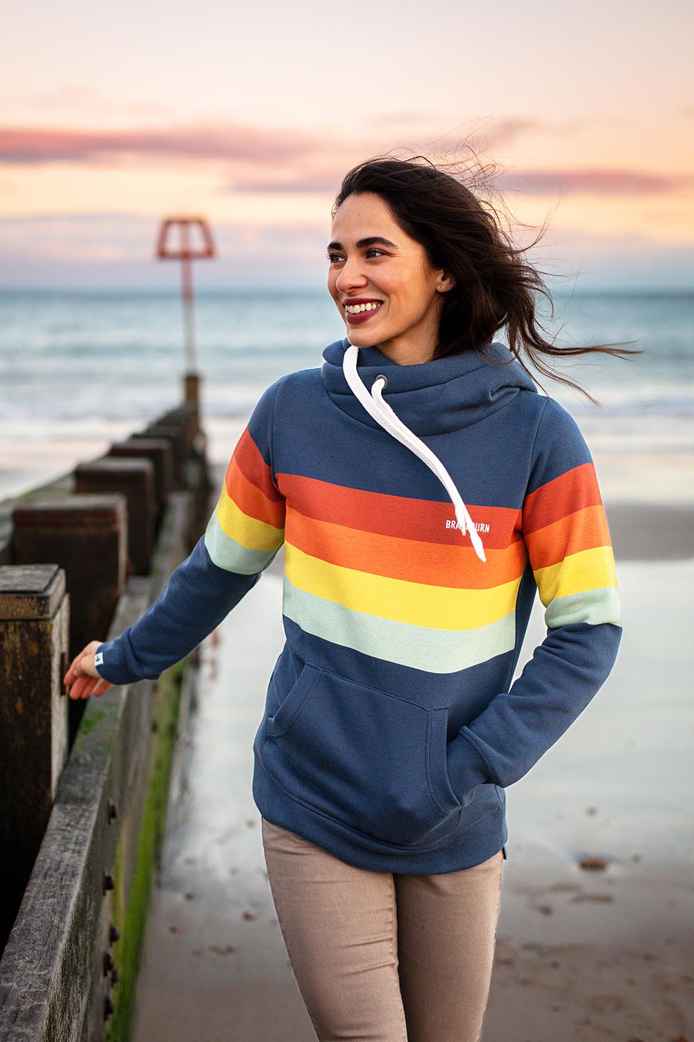 A model wearing the Elise Stripe Cotton Blend Hoodie in colour Multi (Blue), from the front, showing the whole outfit
