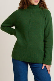 A model wearing the Forest Knitted Roll Neck Jumper in colour Green (Green), from the front, cropped image