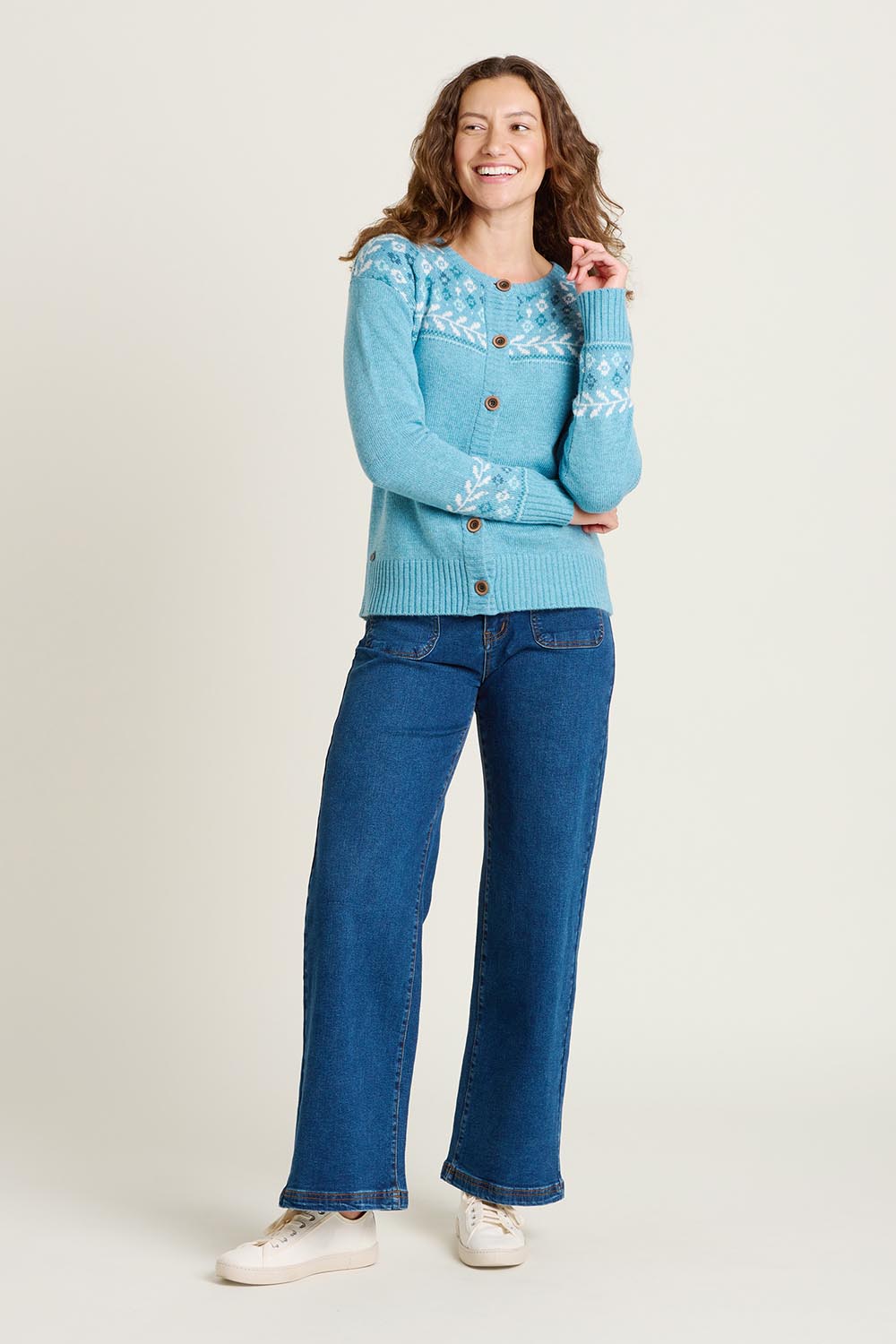 A model wearing the Laurel Knitted Cardigan in colour Blue (Blue), from the front, showing the whole outfit