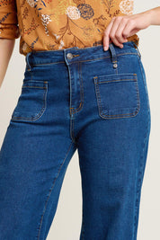 A model wearing the Wide Straight Leg Jeans in colour Denim (Blue), from the front, cropped image