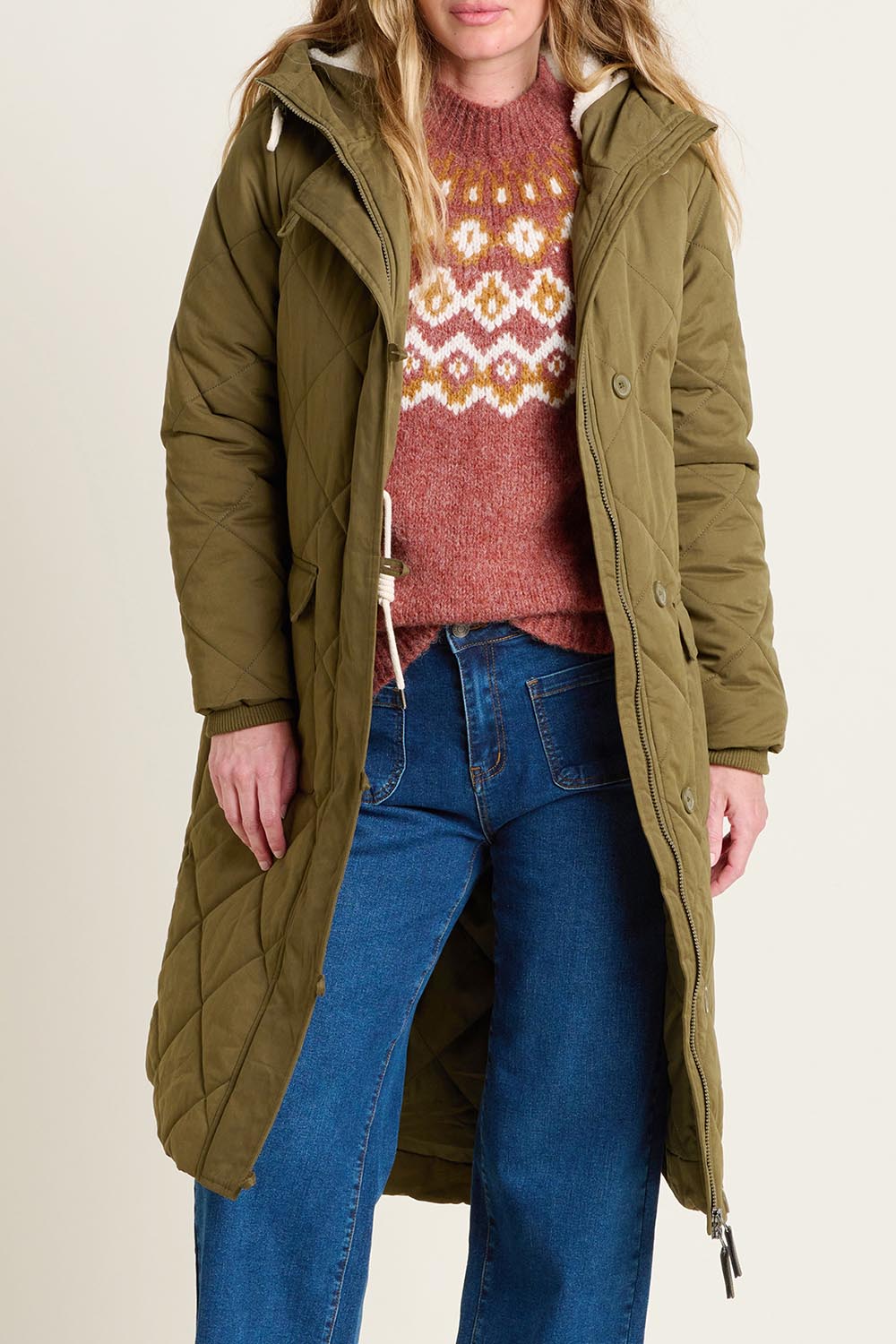 A model wearing the Bradstock Hooded Parka Jacket in colour Khaki (Green), from the front, cropped image