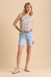 A model wearing the Slim Fit Denim Short in colour Denim (Blue), from the front, showing the whole outfit