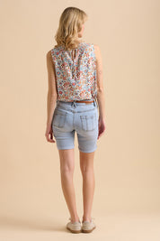 A model wearing the Slim Fit Denim Short in colour Denim (Blue), from the front, showing the whole outfit