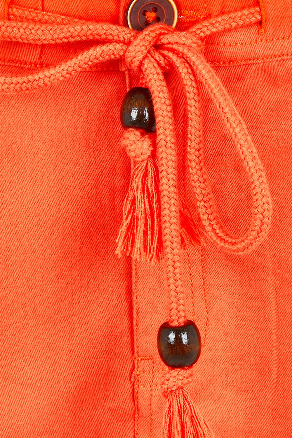 Product shot of the Red Cotton Beach Short in colour Red (Red), detail
