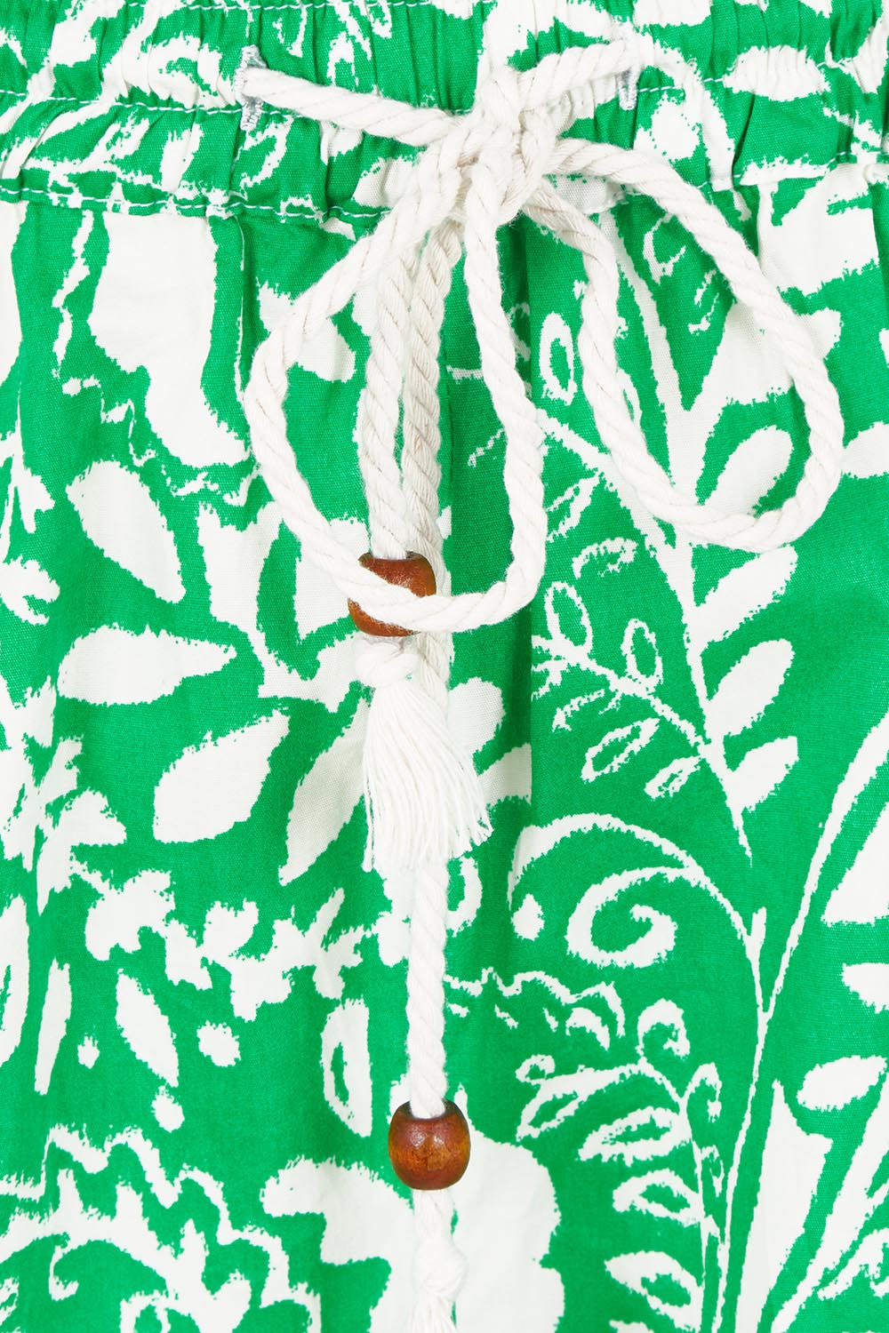Product shot of the Wildflower Cotton Short in colour Green (Green), detail