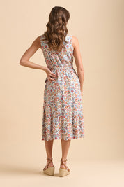 A model wearing the Cream Secret Garden Midi Dress in colour Multi, from the back