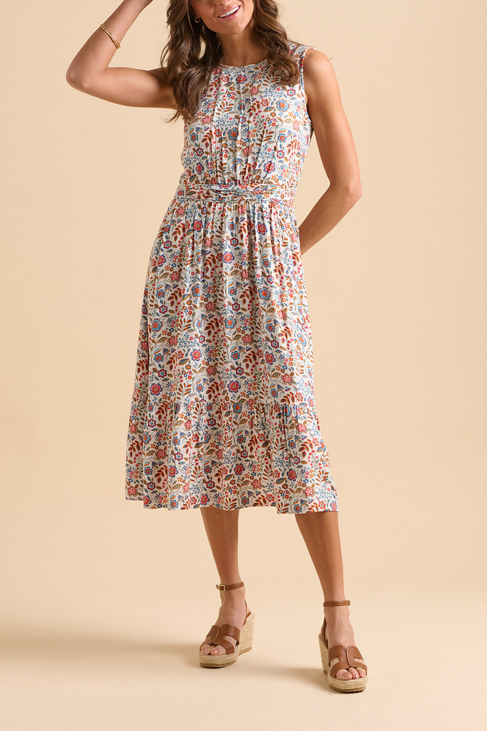 A model wearing the Cream Secret Garden Midi Dress in colour Multi, from the front, cropped image