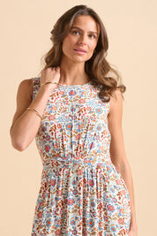A model wearing the Cream Secret Garden Midi Dress in colour Multi, from the front, cropped image
