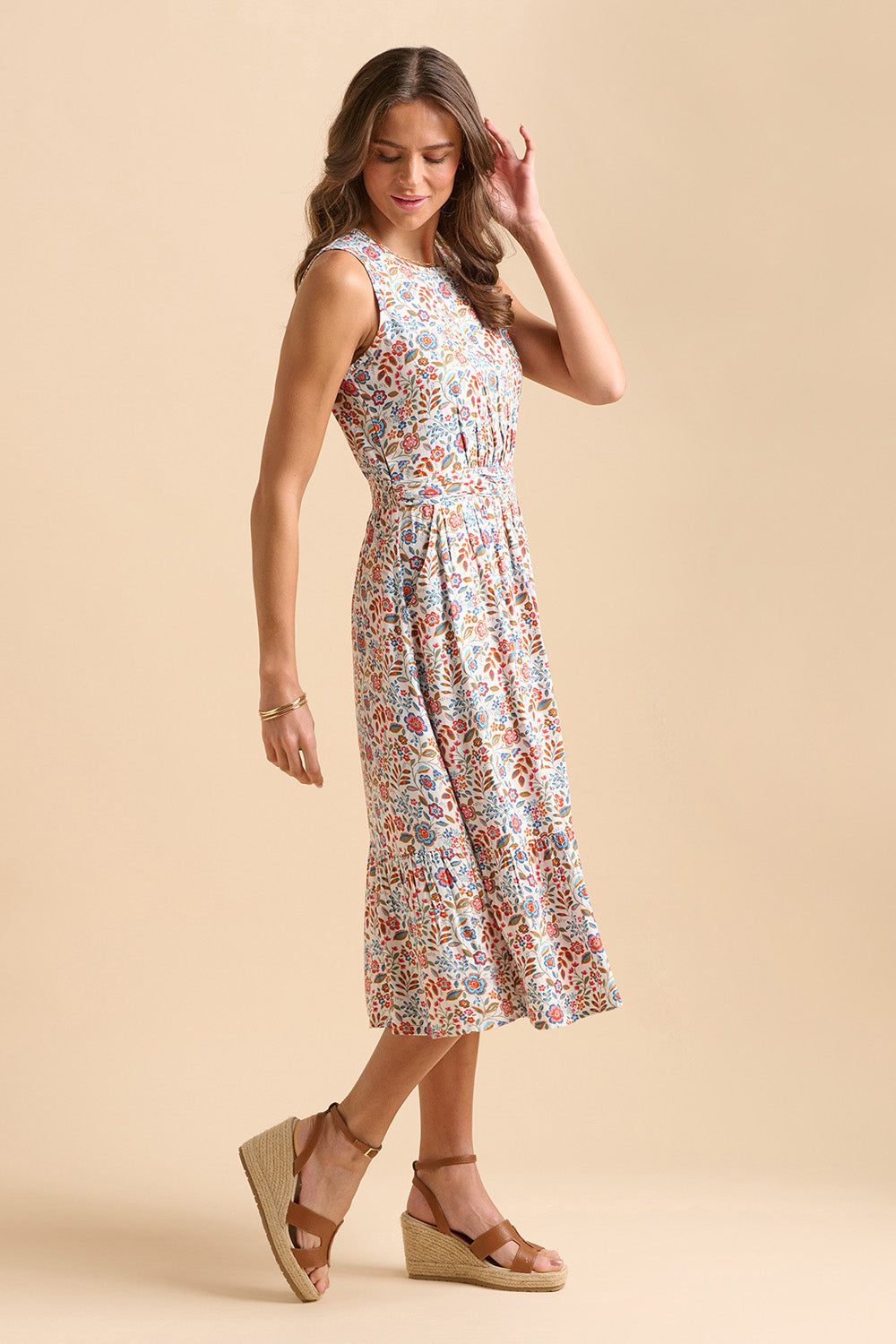 A model wearing the Cream Secret Garden Midi Dress in colour Multi, from the front, showing the whole outfit