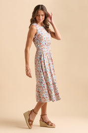 A model wearing the Cream Secret Garden Midi Dress in colour Multi, from the front, showing the whole outfit