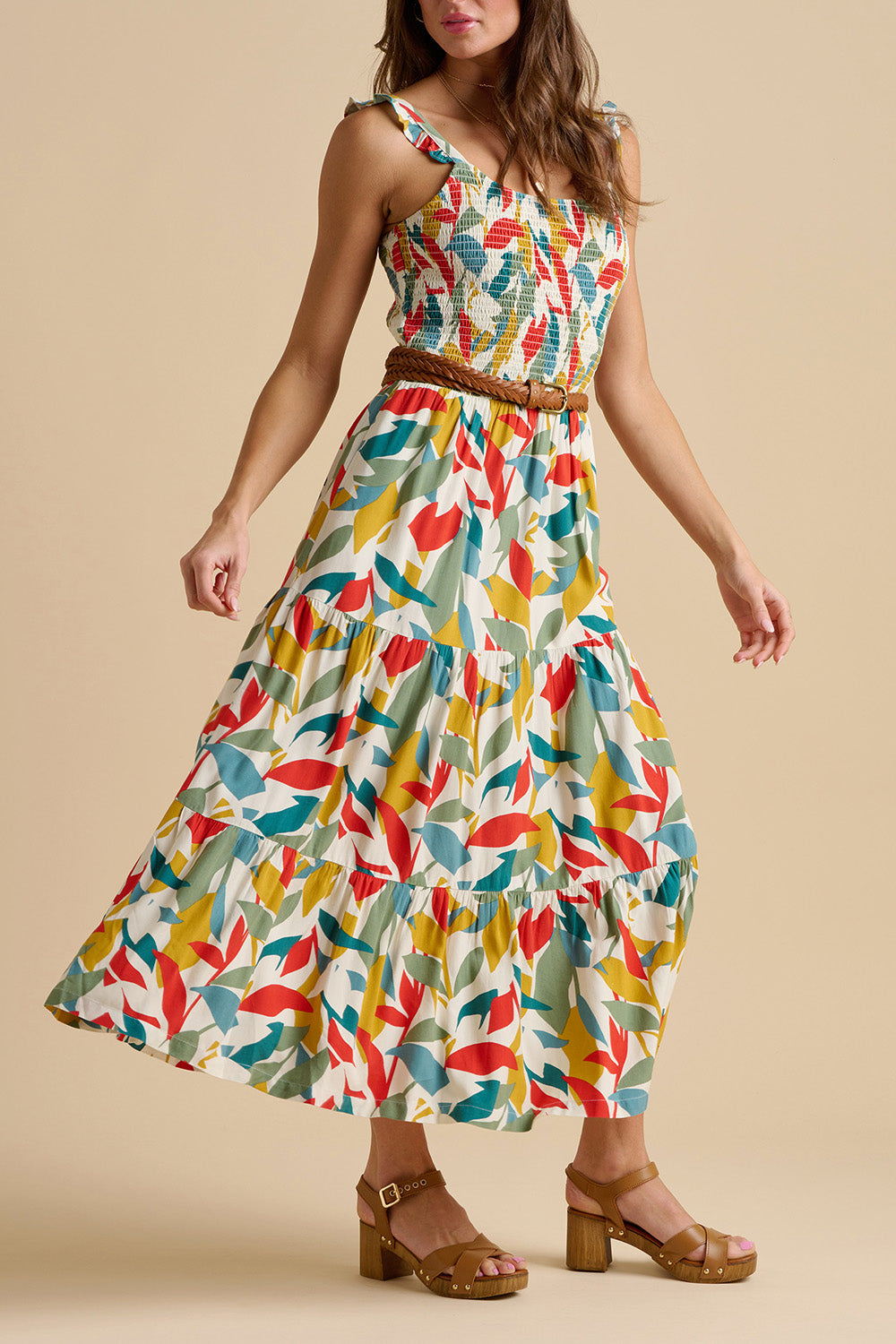 A model wearing the Falling Leaves Maxi Dress in colour Multi, from the front, cropped image