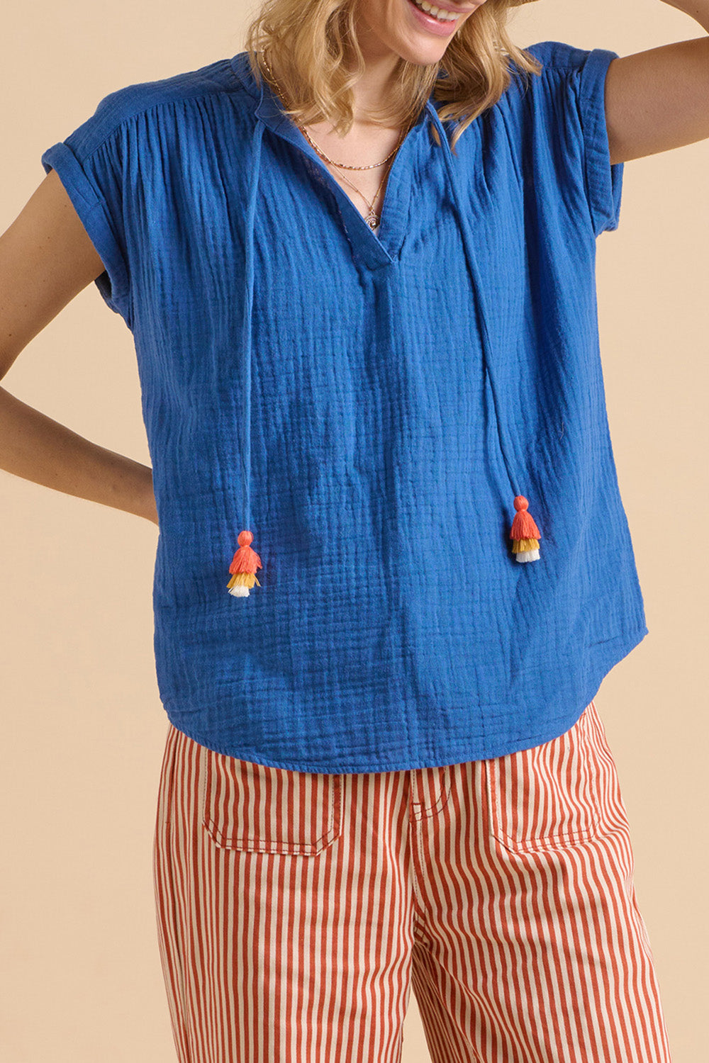A model wearing the Ocean Cotton Blouse in colour Blue (Blue), from the front, cropped image