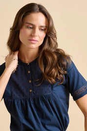 A model wearing the Quay Cotton Blouse in colour Navy (Blue), from the front, cropped image