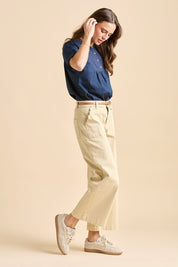 A model wearing the Quay Cotton Blouse in colour Navy (Blue), from the front, showing the whole outfit