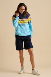A model wearing the Chest Stripe Elsie Cotton Blend Hoodie in colour Multi (Blue), from the front, showing the whole outfit