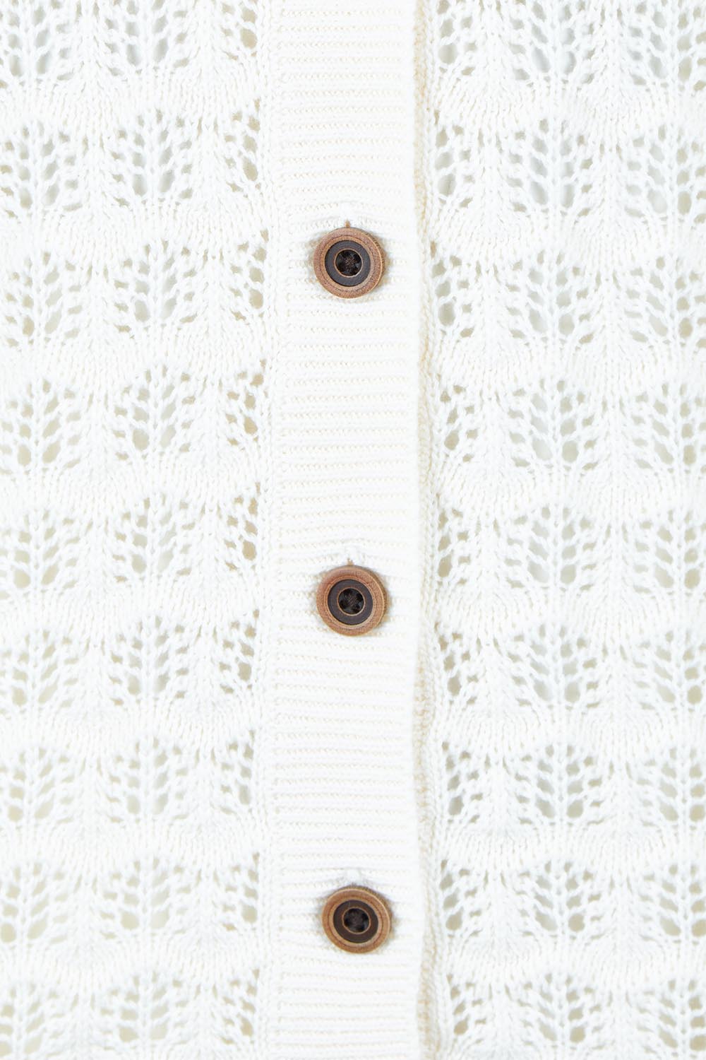 Product shot of the Pointelle Knitted Cotton Button Tank in colour Ceam, detail