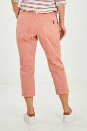 Model Luisa wearing size 10 of the Agatha Jeans in colour Coral (Pink), from the back