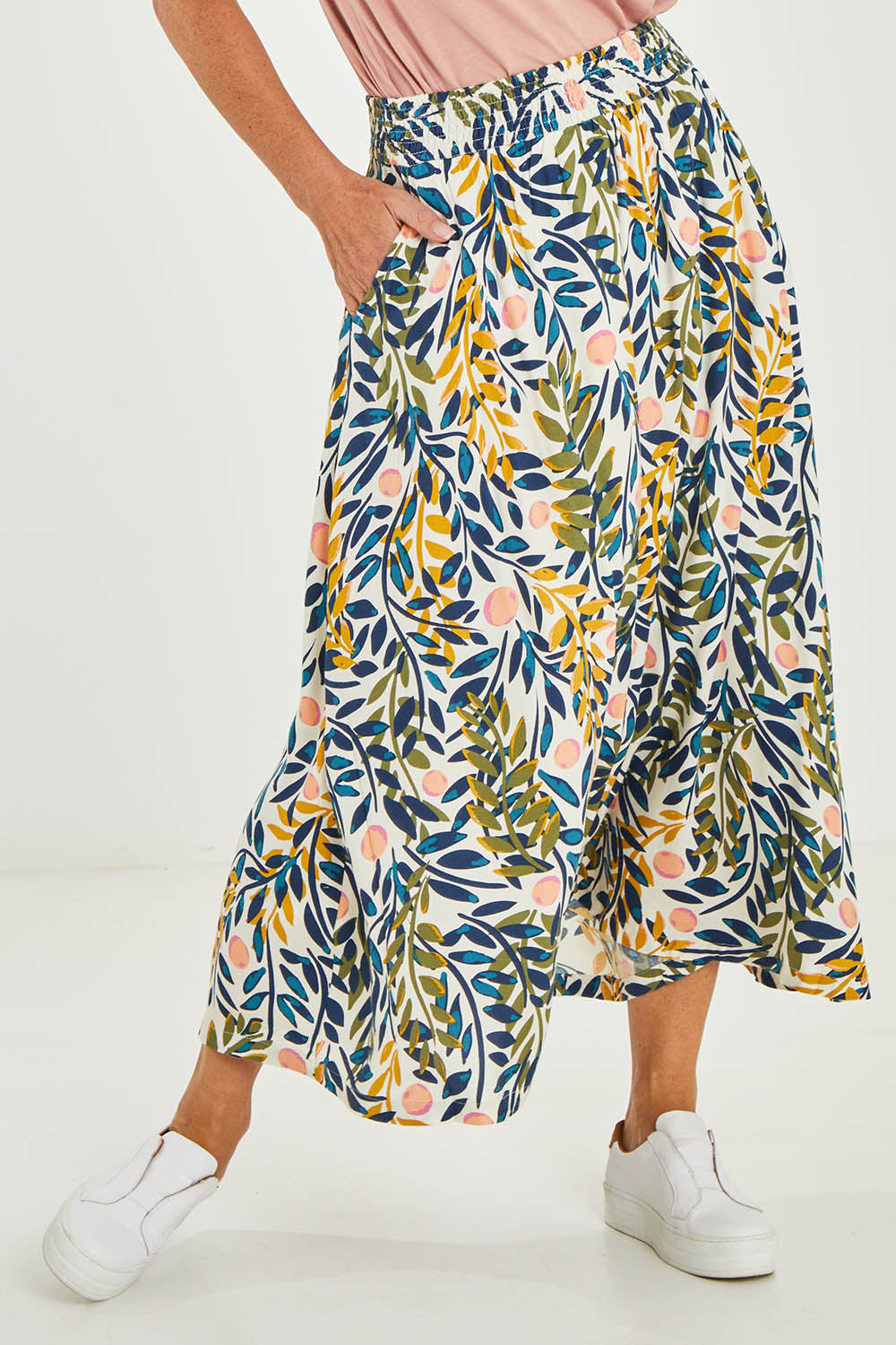 Model Luisa wearing size 10 of the Trailing Maxi Skirt in colour Multi (White), from the front, cropped image