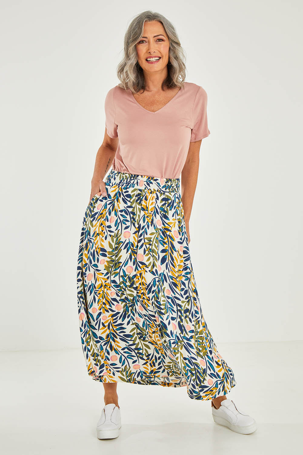 Model Luisa wearing size 10 of the Trailing Maxi Skirt in colour Multi (White), from the front, showing the whole outfit