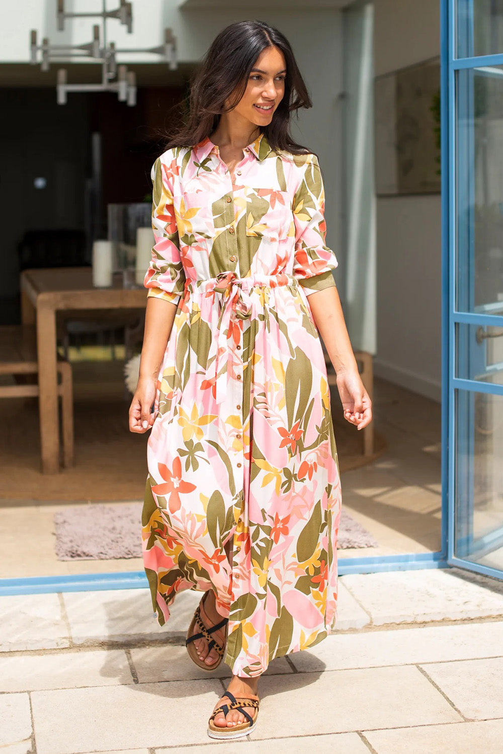A model wearing the Tropical Palm Shirt Dress in colour Multi (Pink), from the front, showing the whole outfit