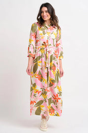 A model wearing the Tropical Palm Shirt Dress in colour Multi (Pink), from the front, showing the whole outfit