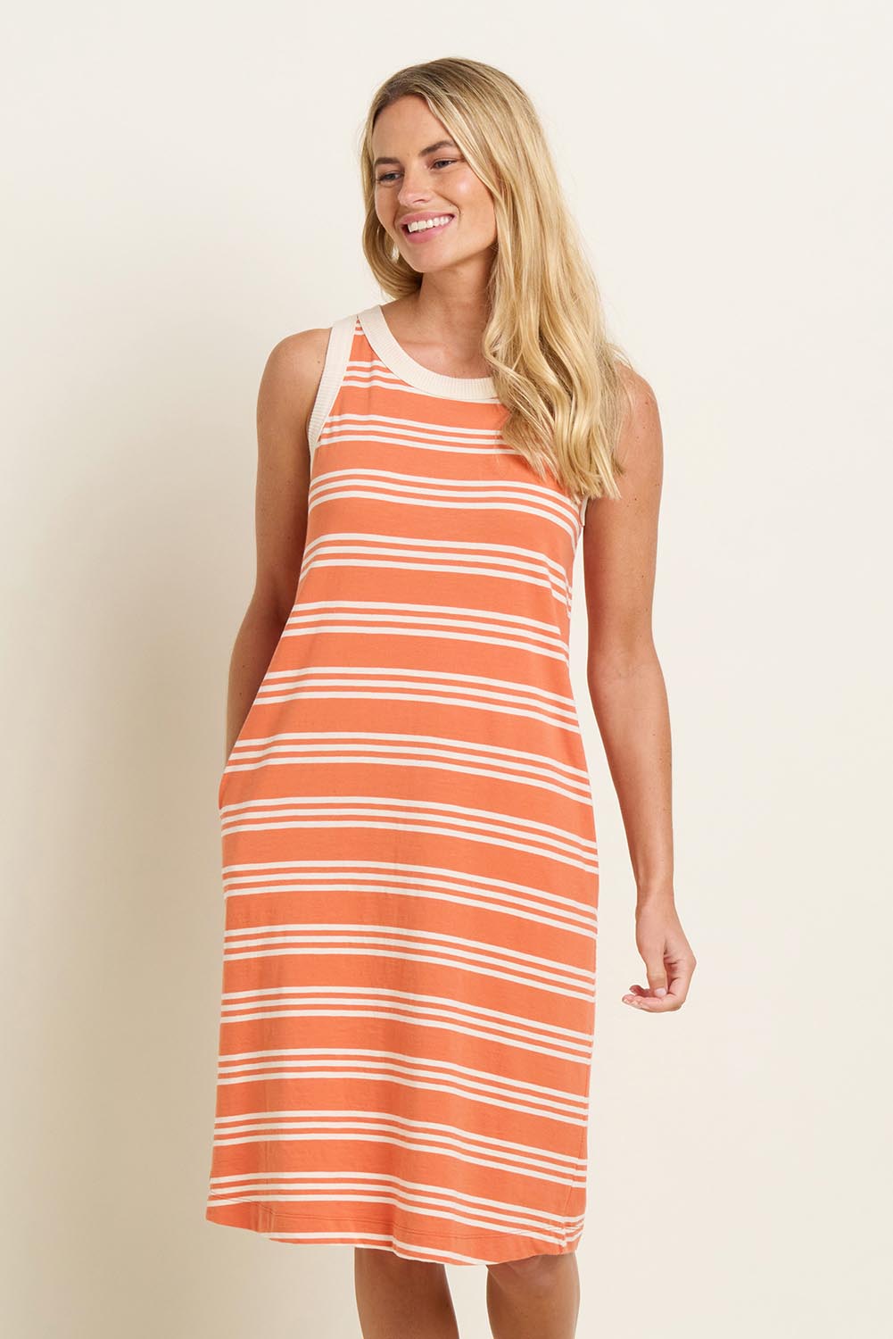 A model wearing the Ava Stripe Sleeveless Dress in colour Stripe, from the front, cropped image