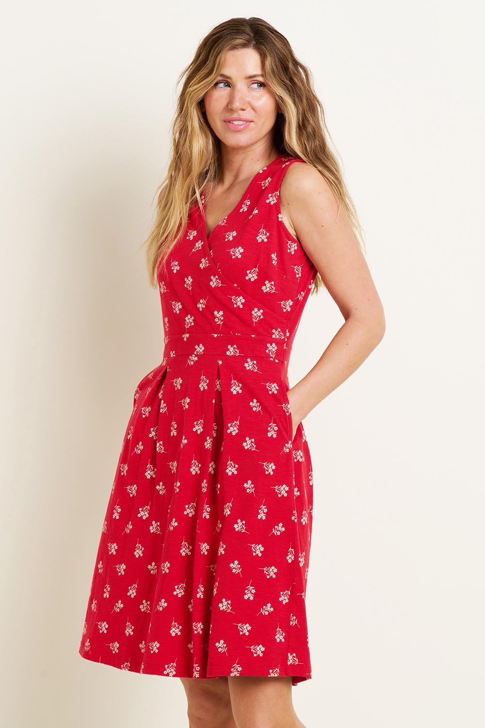 A model wearing the Marine Sleeveless Dress in colour Red (Red), from the front, cropped image