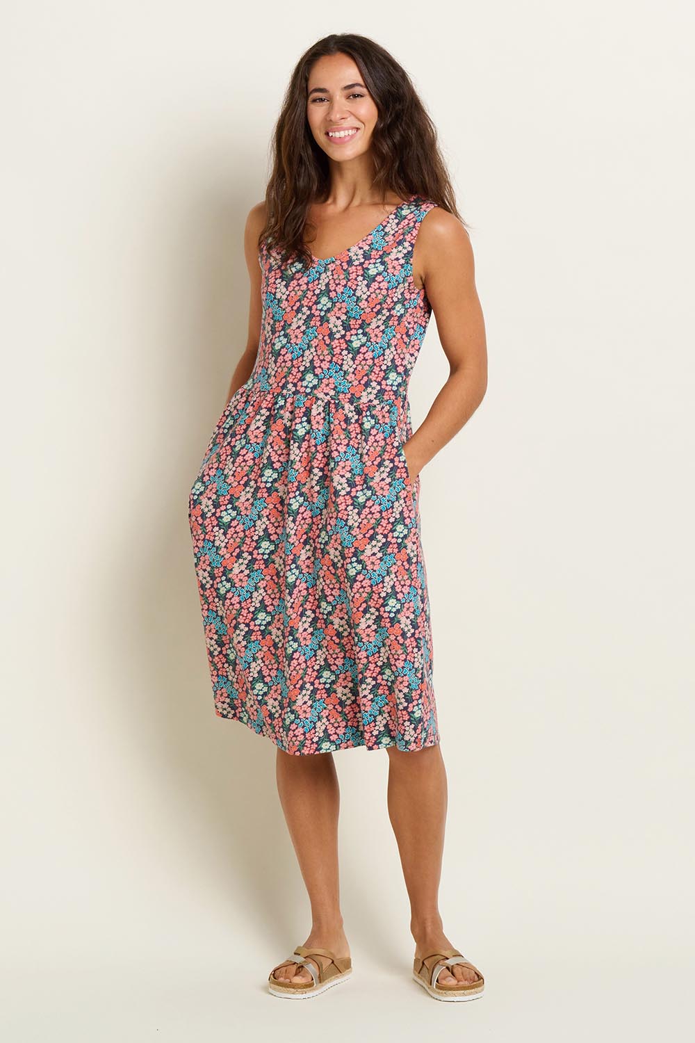 A model wearing the Millie Sleeveless Dress in colour Multi (Blue), from the front, showing the whole outfit