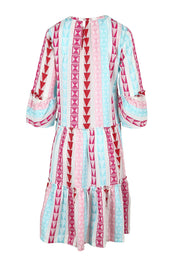 Product shot of the Nessa Dress in colour Multi (Pink), from the back