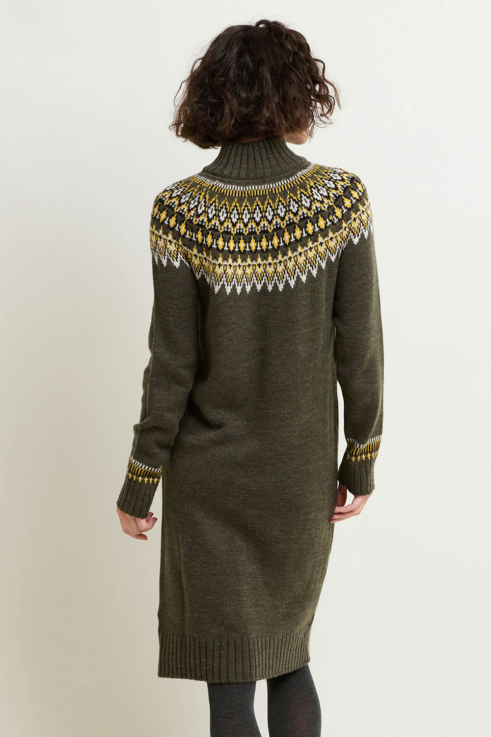 A model wearing the Roll Neck Knitted Dress in colour Grey (Grey), from the back