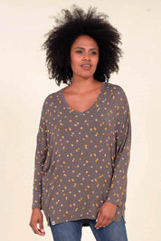 A model wearing the Dotty Loose Fit L/S Top in colour Navy (Blue), from the front, cropped image