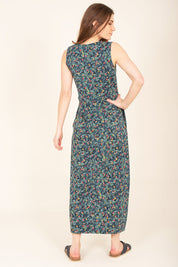 A model wearing the Summer Berry Maxi Dress in colour Multi (Blue), from the back
