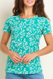 A model wearing the Bamboo Leaves Tshirt in colour Green (Green), from the front, cropped image