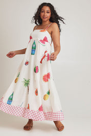 Model Terri-Leigh wearing size L of the Tutti Fruitti Cotton Maxi Dress in colour Fruit, from the front, showing the whole outfit