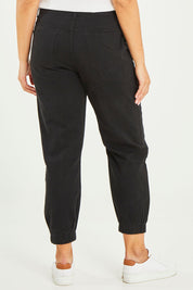 Model Terri-Leigh wearing size 14 of the Sara Cuffed Jean in colour Black (Black), from the back