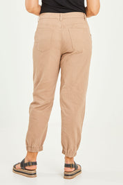Model Terri-Leigh wearing size 14 of the Sara Cuffed Jean in colour Cream, from the back