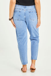 Model Terri-Leigh wearing size 14 of the Kristy Straight Jean in colour Midblue (Blue), from the back