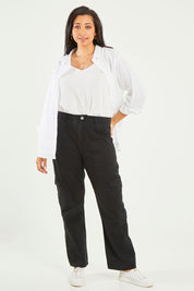 Model Terri-Leigh wearing size 14 of the Amanda Straight Jean in colour Black (Black), from the front, showing the whole outfit