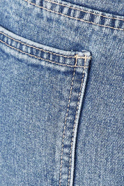 Product shot of the Elle Straight Jean in colour Midblue (Blue), detail