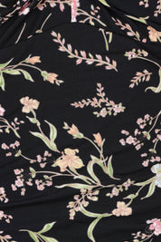 Product shot of the Twist Front Bandeau One Piece in colour Wildflower (Black), detail