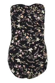 Product shot of the Twist Front Bandeau One Piece in colour Wildflower (Black), detail