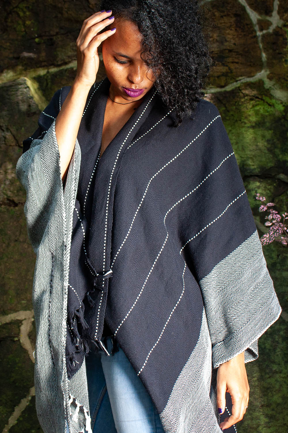 A model wearing the Anna Cape in colour Blue (Blue), from the front, showing the whole outfit