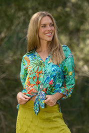 A model wearing the Tea House Shirt in colour Teahouse (Green), from the front, showing the whole outfit